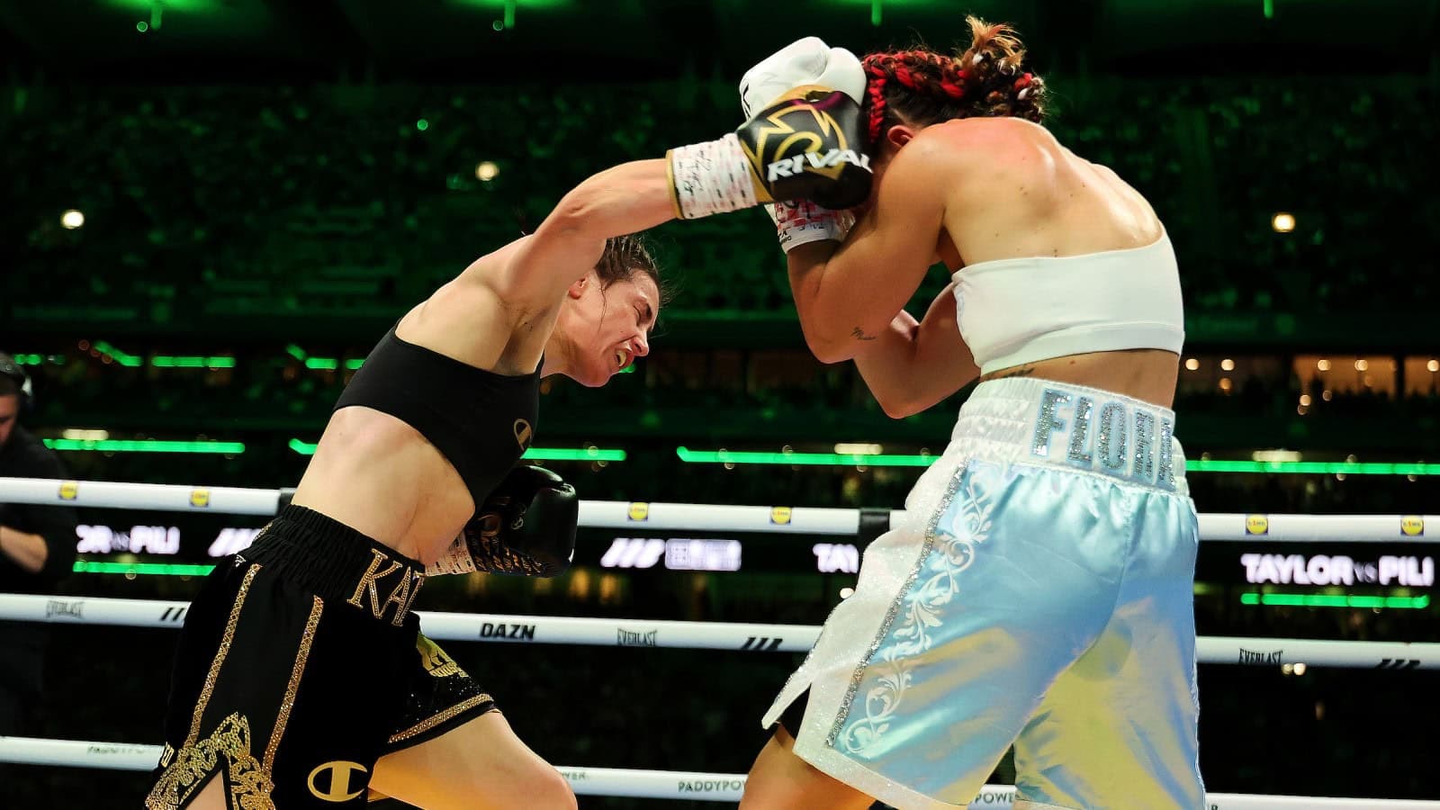 Katie Taylor lands a punch on Flora Pili during her final fight at Croke Park